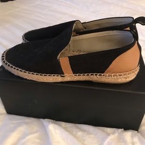 Black and brown flats